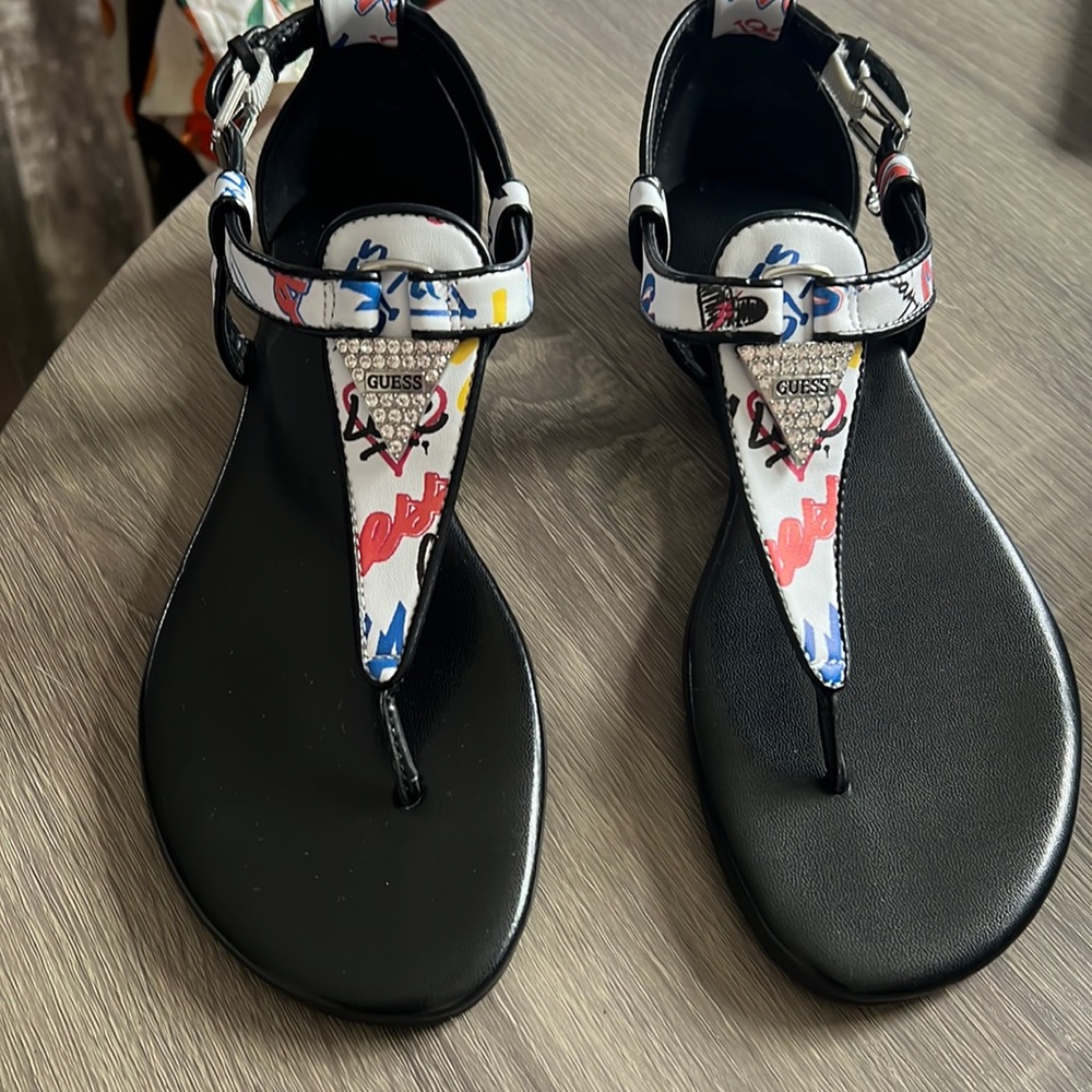 Brand New size 8 Guess sandals with charm